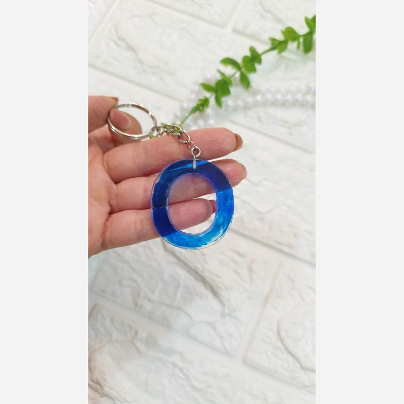 جاسوئیچی رزینی رنگ آبی حرف O